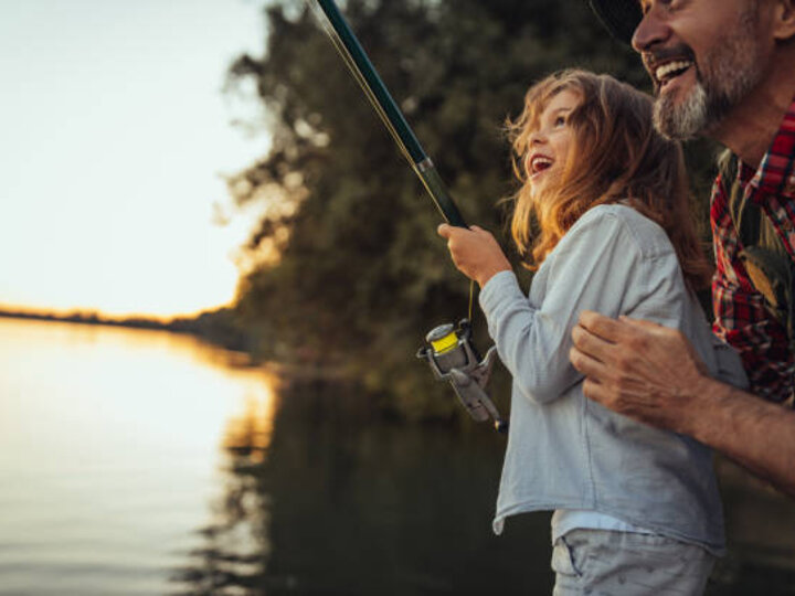 father and daughter fishing